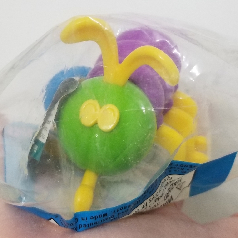 1999 Hasbro Cootie bug large vibrating keychain, still in bag (with tear)